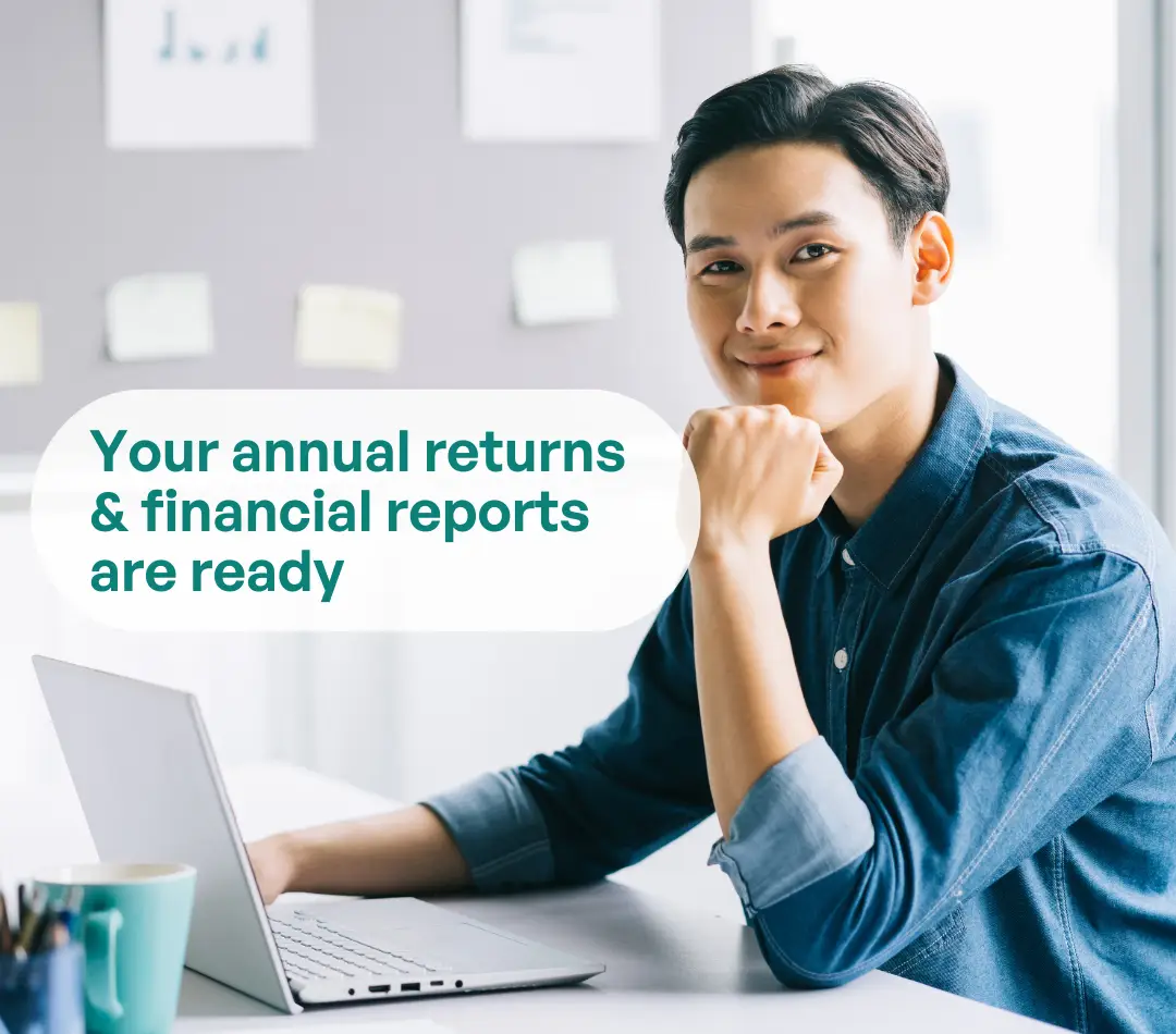Person smiling at a laptop; text overlay reads ‘Your annual returns & financial reports are ready’.